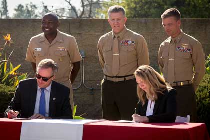 The Honorable Meredith A. Berger, performing the duties of the Under Secretary of the Navy, and David Hochschild, Chair, California Energy Commission, signed a Memorandum of Understanding, Dec. 1, 2021, renewing Department of the Navy cooperation with the CEC for another five years in a partnership that supports Navy and Marine Corps installation efforts to address energy resilience issues, climate initiatives, fossil fuel reduction, greenhouse gas reductions, water consumption, and alternative fuel vehicles. Marine Corps photo by Lance Cpl. Jose S. GeurreroDeleon