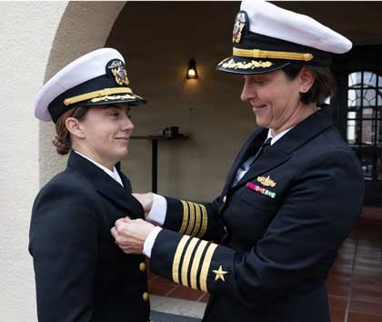 U.S. Navy Captain Sarah Self-Kyler, the commanding officer of Navy Public Affairs Command, pins the command ashore pin onto Cmdr. Jaqueline Pau, the commanding officer of Fleet Public Affairs Center San Diego, during an establishment of command ceremony, Jan. 21, 2026. Fleet Public Affairs Center San Diego provides operational public affairs support to current and emerging public affairs and visual information engagements. U.S. Navy Photo by MC1 Charles J. Scudella III.