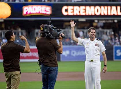 SAN DIEGO (May 8, 2026) Capt. Loren Jacobi, commanding officer of Naval Base Coronado, poses on the field during NASCAR Day at Petco Park prior to throwing the ceremonial first pitch before a San Diego Padres game, May 8, 2026. NASCAR San Diego Weekend will take place at Naval Base Coronado June 19-21, leveraging the scenic and historic setting to deliver a unique, high-profile sports experience that blends motorsports with pop culture and military heritage. U.S. Navy photo by MC1 Charles J. Scudella III